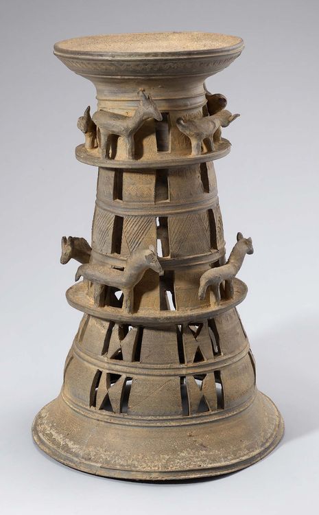 Pedestal with animal figurines