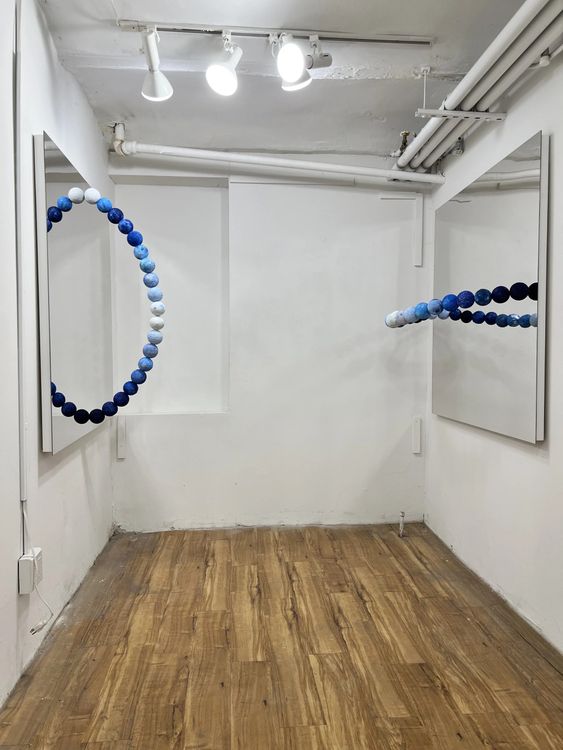 Hiroko Ohno, "Before the Beginning" and "Beyond the End," 2026. Mineral pigments, seashell, mica, Styrofoam, plaster, acrylic, and acrylic mirror. 48 × 48 × 15 inches, each.